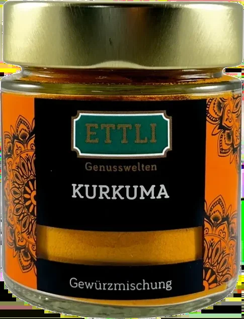 Curcuma in a screw-top jar – ground turmeric